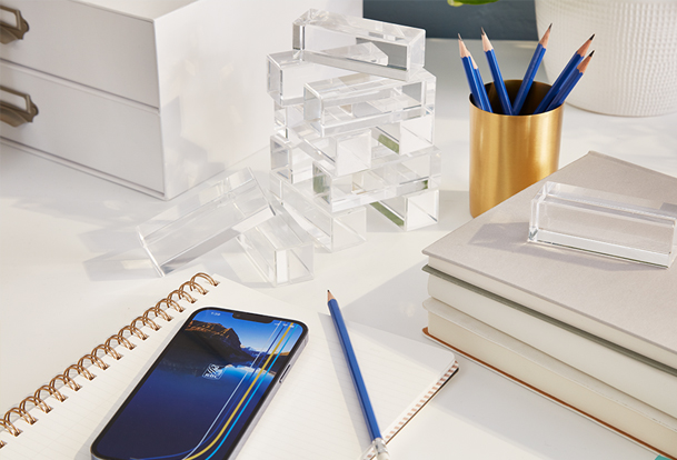 An illustration of a person practicing chess outside of a café.