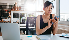Woman looking at her smartphone. 