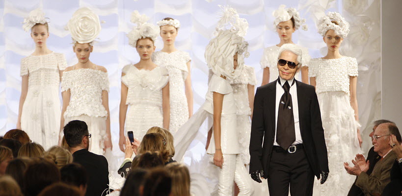 Chanel’s creative director Karl Lagerfeld walking the runway in a 2009 fashion show. 